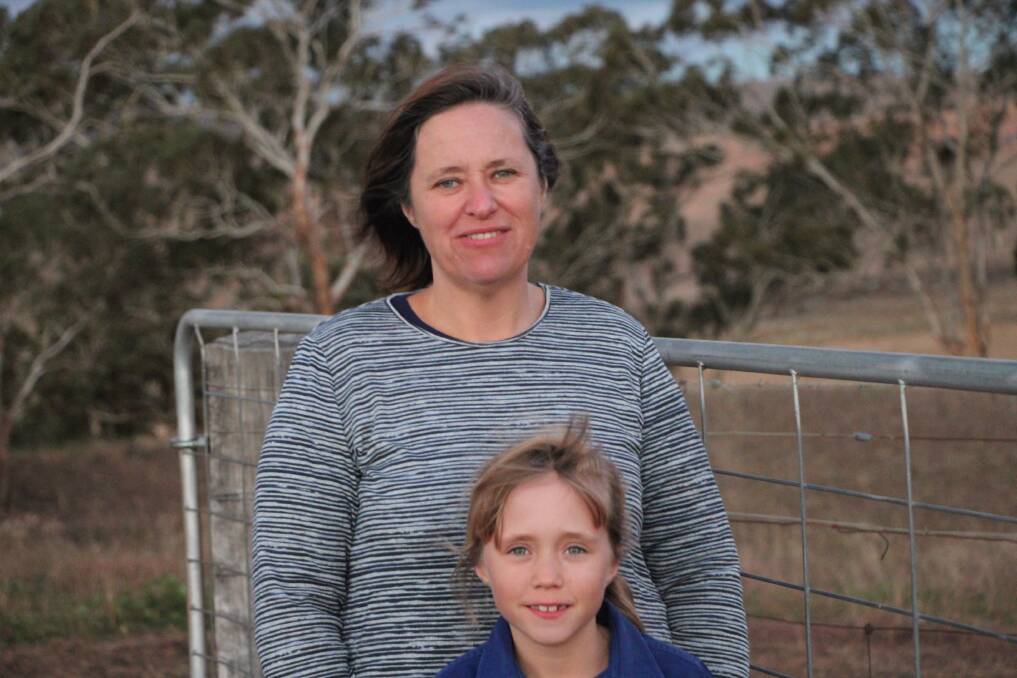 Cassandra McLaren, who started up the facebook page One Day Closer to Rain, with her eight-year-old daughter Emma, who inspired it. Photo: CONTRIBUTED