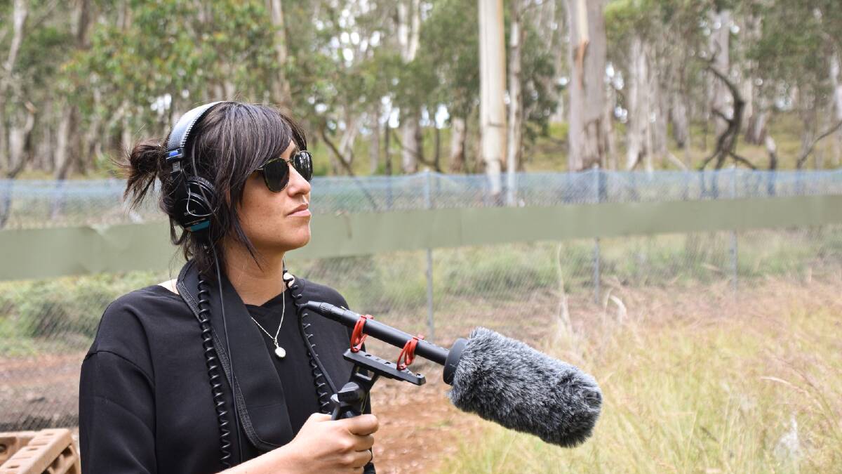 producer Laura Corrigan gathers nature sounds for a story. Picture: Simon McCarthy 