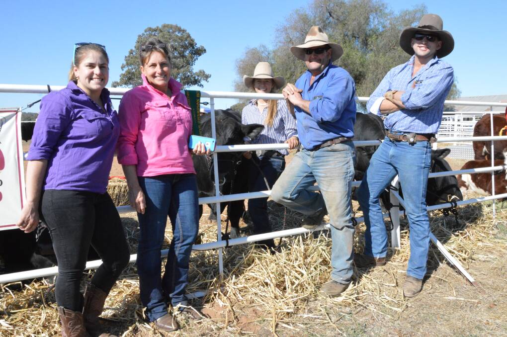 The Wright stuff: Sally, Tanya, Molly, Tony and Artie Wright from Peak Hill, look over the cattle at the 2017 Show. Photo: Christine Little.
