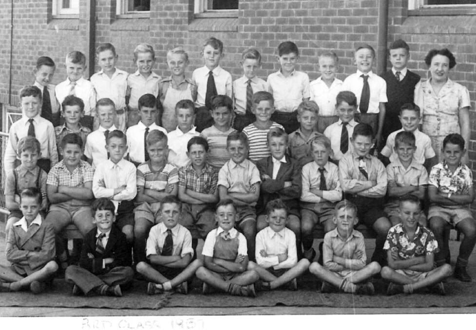 Sixty years in the making: Mrs Ruby Stack with her 3rd grade class from Parkes Public in 1957. Photo: Rob Houghton.