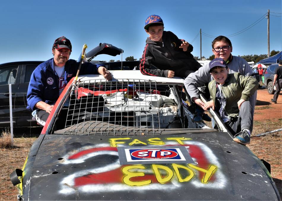 Fuel Fired Fun: Eddy Folsom with his Demolition Derby car Fast Eddy, along with Bruce Mercina, Alan Clifton and Trevor Martin. Photo: Supplied.