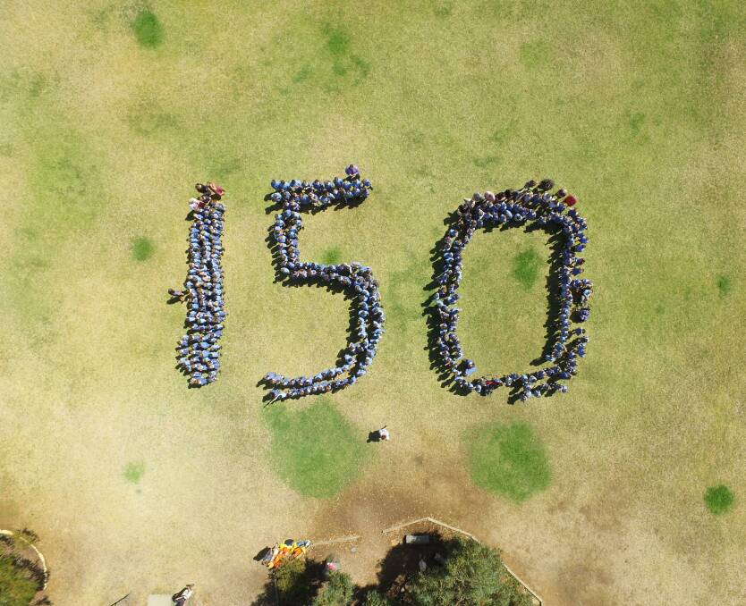 Time for celebrations: Parkes Public school students display 150 in recognition of the 150th anniversary. Photo: Supplied.