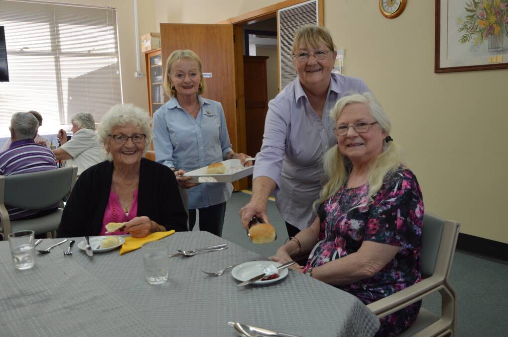 The joy of volunteering: Neighbourhood Central's Liz Jones, Sue Hennessy volunteer their time with Aileen Townsend and Jann Corcoran. Photo: Supplied.