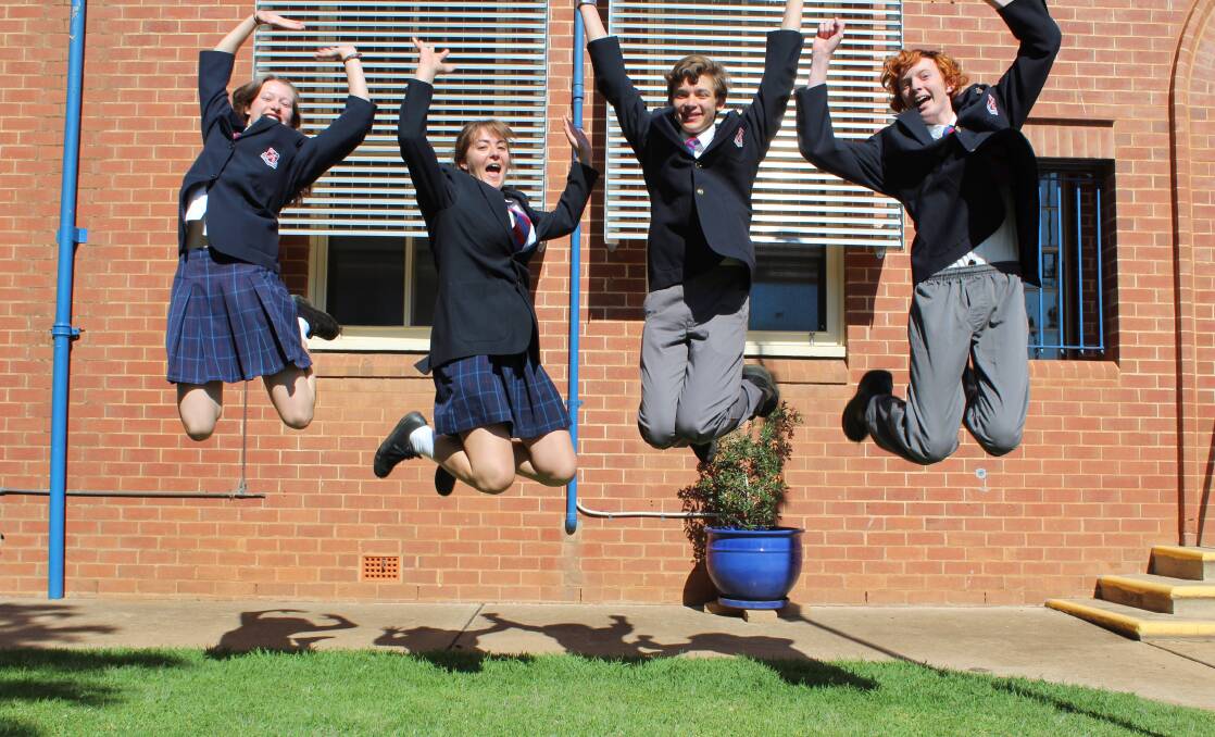Jumping for joy: Students at Parkes High School loved the chance to celebrate Education Week with friends and family. Photo: Supplied.