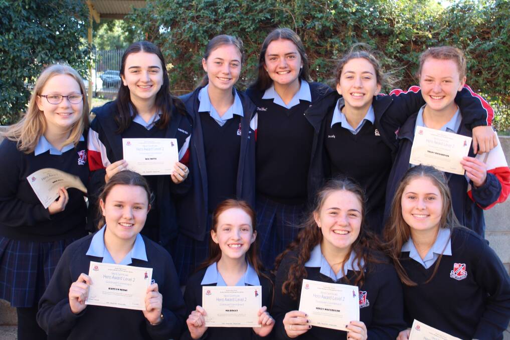 Super Heroes: Ongoing commitment and dedication resulted in a number of students receiving merit certifiucates and Hero Awards. Photo: Supplied.
