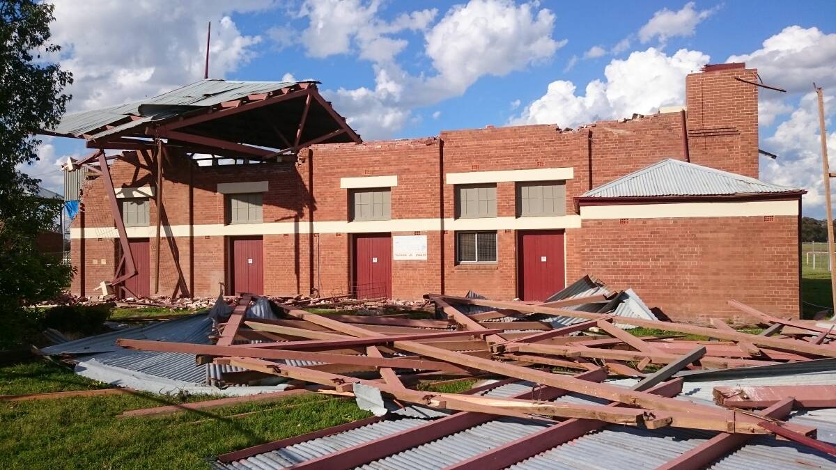 Destruction: There was massive amounts of damage to the iconic grandstand at Parkes Racecourse after the devastating storm in 2016. Photo: File.