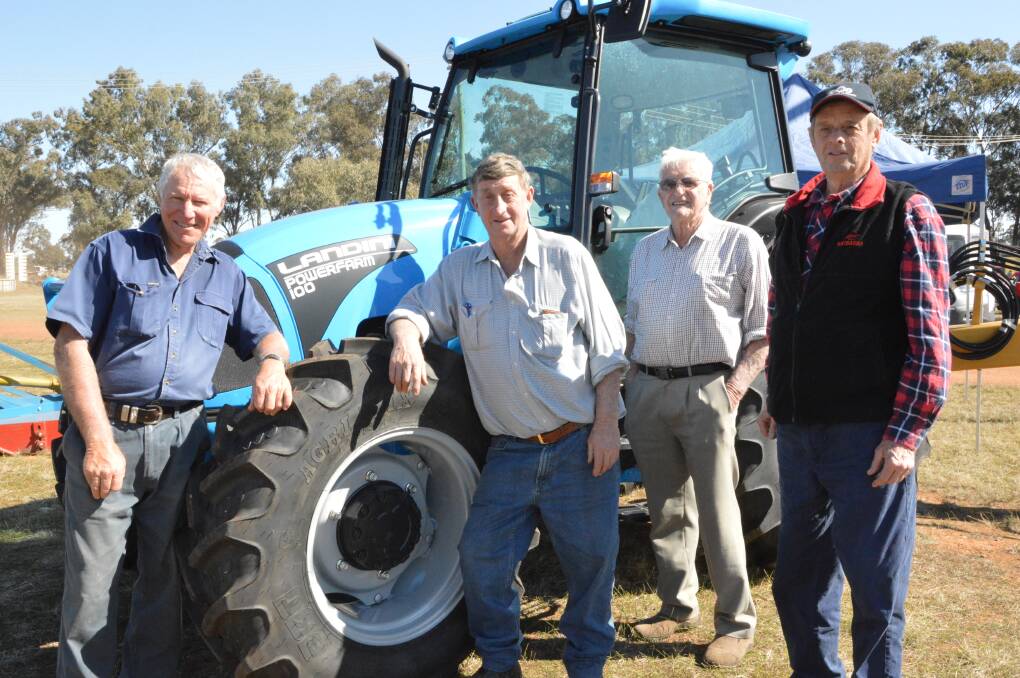 Farmers Friend: Enjoying the tractor display were Phillip Forrestal, Colin Hutchins, Duck Robinson and Max Hutchins. Photo Christine Little.