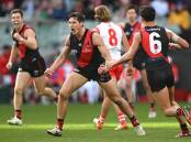 Essendon have come from behind in the last term to deliver Sydney an AFL blow in a nine-point win.