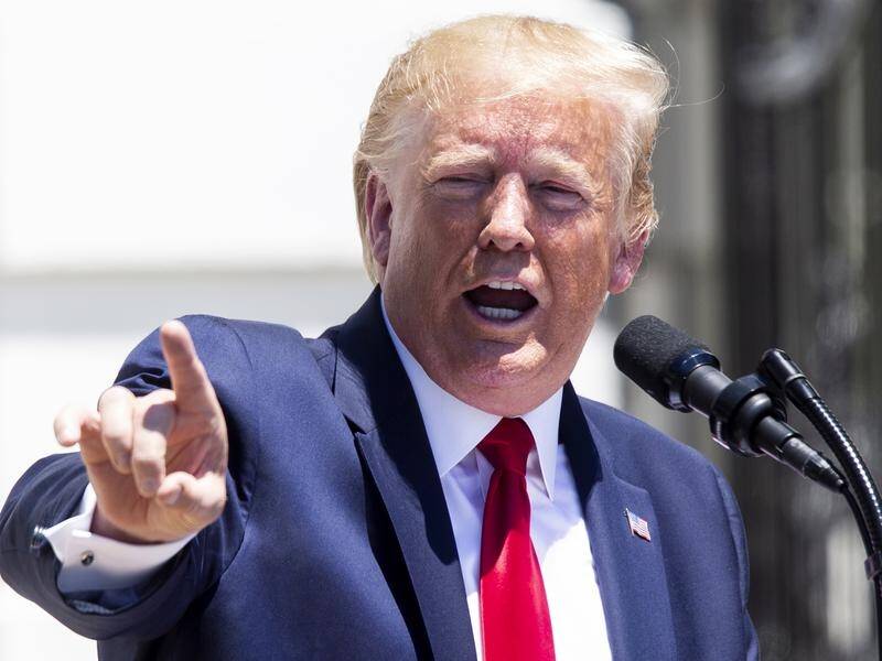 President Donald Trump says many people agree with his racist tweets directed at four congresswomen.