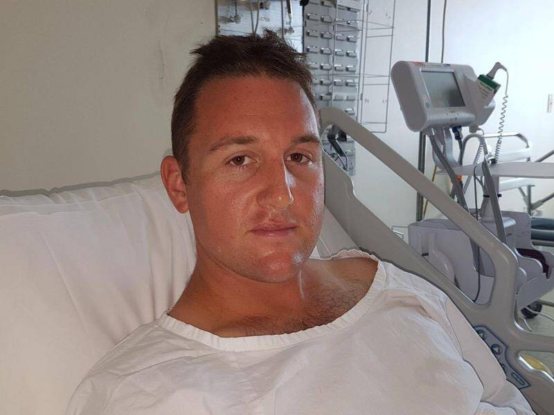 Constable Hayden Edwards has undergone surgery after he was stabbed with a hunting knife.