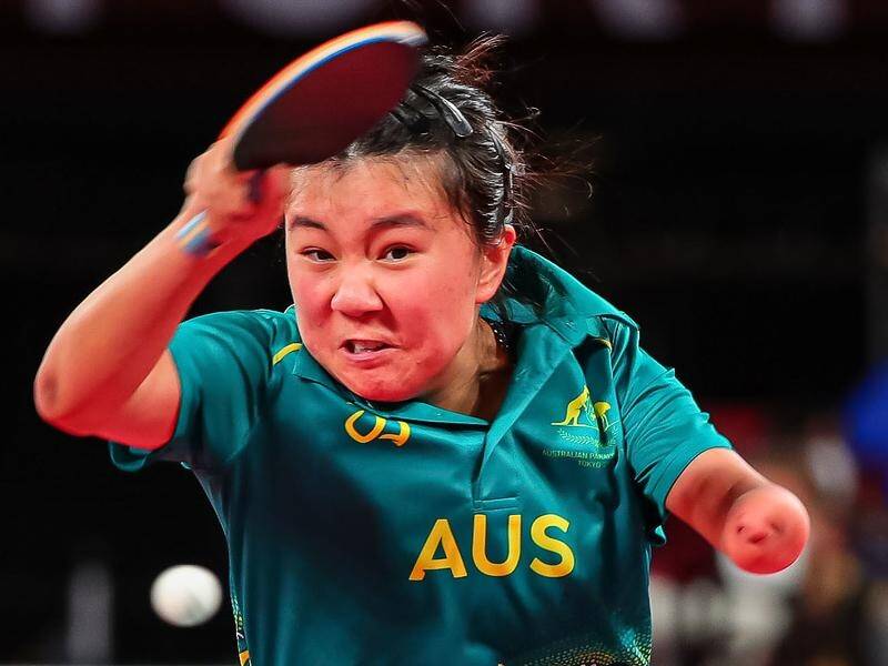 Australia's Qian Yang has joined three of her compatriots in claiming a semi-final win in Tokyo.