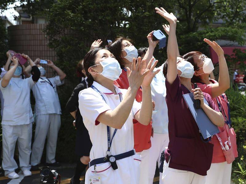 A special air force flyover has saluted Tokyo medical workers who are on the coronavirus frontline.