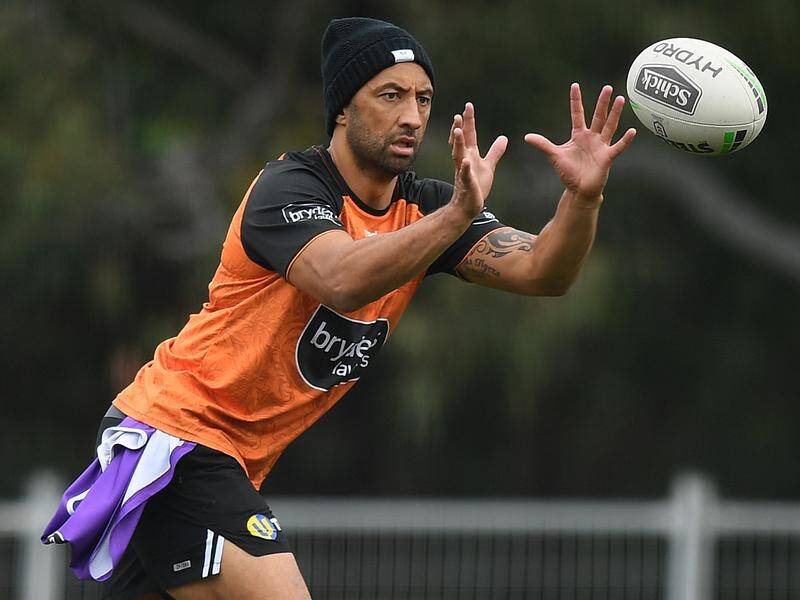 Benji Marshall has been picked by the Wests Tigers a month after being dropped for poor NRL defence.