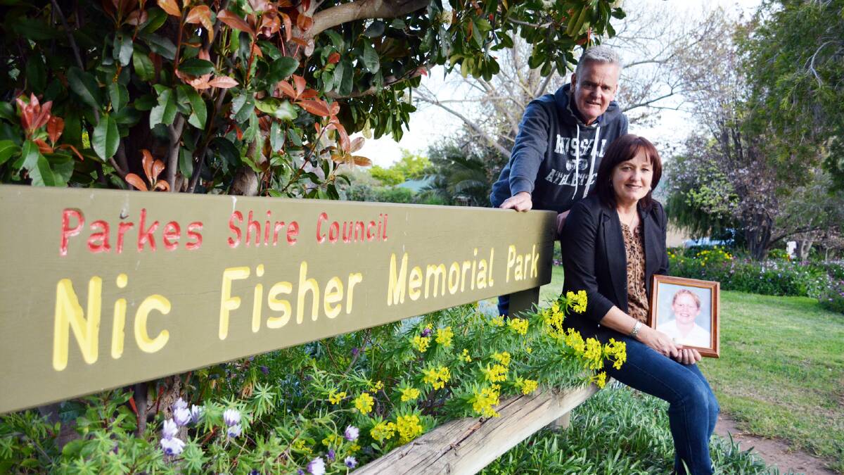 Tony and Judy Fisher in the park in memory of their son, Nic.