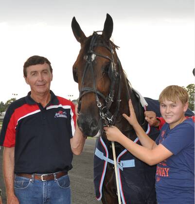 Local pacer Poppy Cee is one of the favourites in Race 2 at today’s Australia Day harness meeting. Pictured with Poppy Cee are owner Geoff Cole and strapper Will Cassell. sub