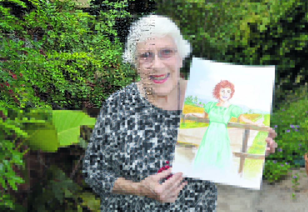 Mardie Dwyer with the painting by local artist Heather Moss that will feature as the front cover of Mardie’s new book “A Chain of Dreams”.  Photo: Bill Jayet    