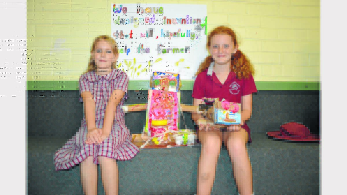 Abigail Sharples and Trudy Richardson (abscent - Adelaide White) with their invention of a Robert to help the farmer with his sheep work.