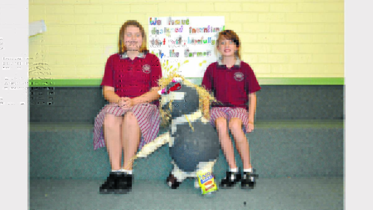 Kayley Phipps and Sally Richter with their Scarecrow.