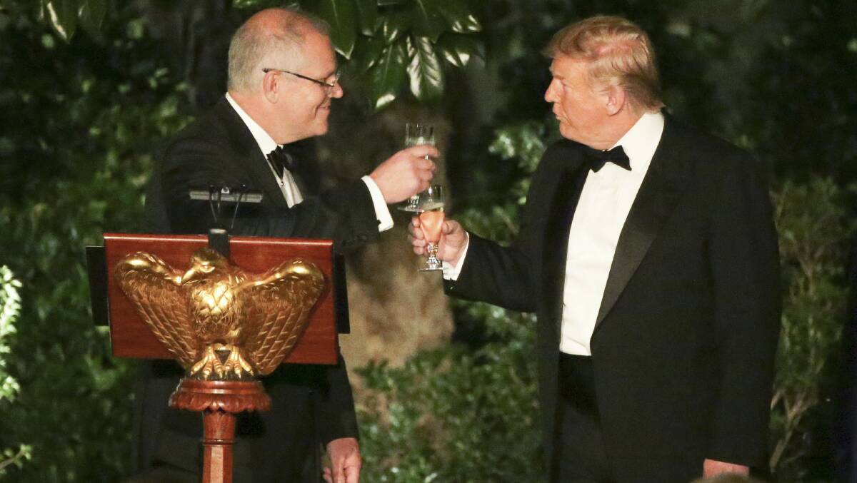 TOASTED: Donald Trump and Scott Morrison at the state dinner at the White House. Picture: Alex Ellinghausen/Fairfax Media