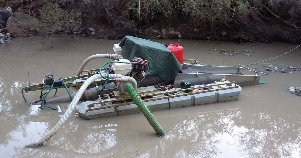 CAUGHT: An illegal mining operation in a river near Mudgee has resulted in a $2500 fine for its operator. Photo: NSW POLICE