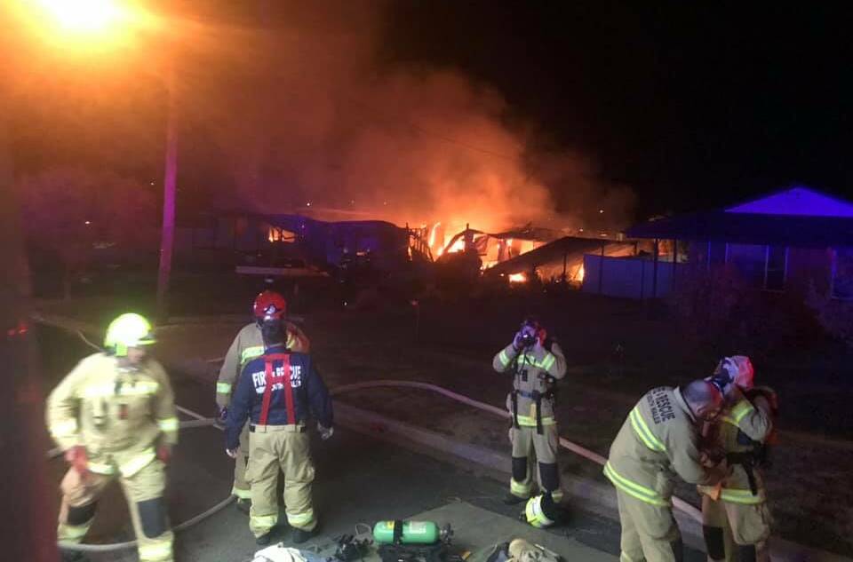 EMERGENCY SCENE: Fire and Rescue NSW crews on site at the Thomas Street house fire that occurred on Thursday night. Photo: FRNSW PARKES