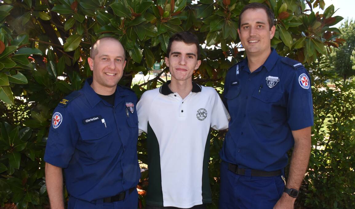 LIFE SAVERS: Bathurst paramedics Christian Stokes and Lachlan Bullock and Kyle Webb, 16. Photo: NADINE MORTON 013119nmkyle1