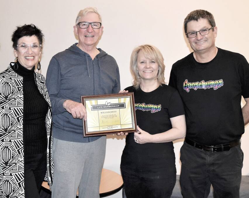 HONOUR: Bill Jayet (centre), with wife Lindy Farrant, accepts his life membership from president Lyn Townsend and past president Neil Westcott. Photo: Jenny Kingham
