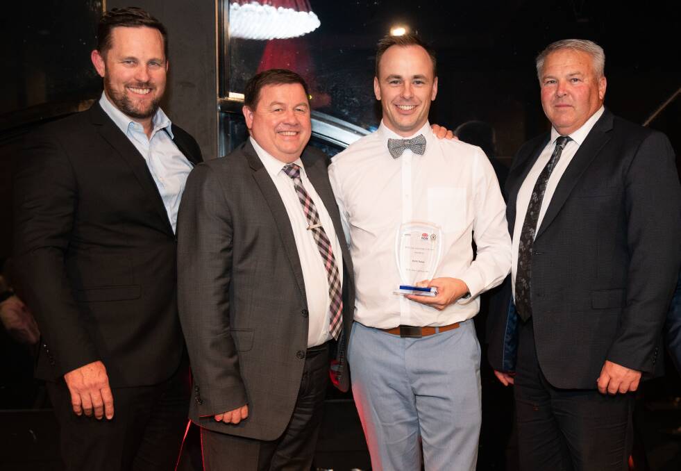 BIG ACHIEVEMENT: Superintendent Mark Wall, PCYC NSW CEO Dominic Teakle and Deputy Commissioner of Police Regional Field Operations Gary Worboys (right) congratulate PCYC Parkes manager Tim Watts on their award win. Photo: Submitted