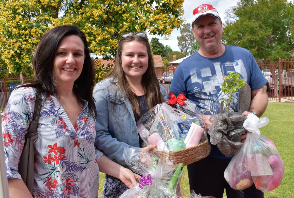 GREAT DAY OUT: Mary-lou Gosper, Hannah McDonald and Andrew Gosper found some great bargains at Rosedurnate's fete in 2017. Photo: Jenny Kingham