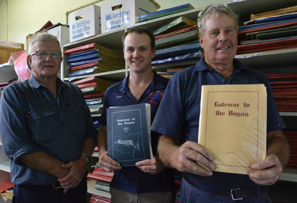 RESEARCH: Chairman of the Bogan Gate 125 years Celebrations committee Graeme Hunter (right), with his trusty assistants Tom Lees and Andrew Britt, is compiling a new Gateway to the Bogan history book in time for the town's 125th anniversary next year. Photo: Christine Little