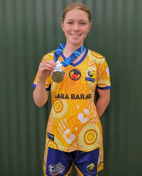 Talented Parkes teenager Makayla Sloane has returned home from the NSW First Nations Football Festival with a gold medal. Photo on Facebook