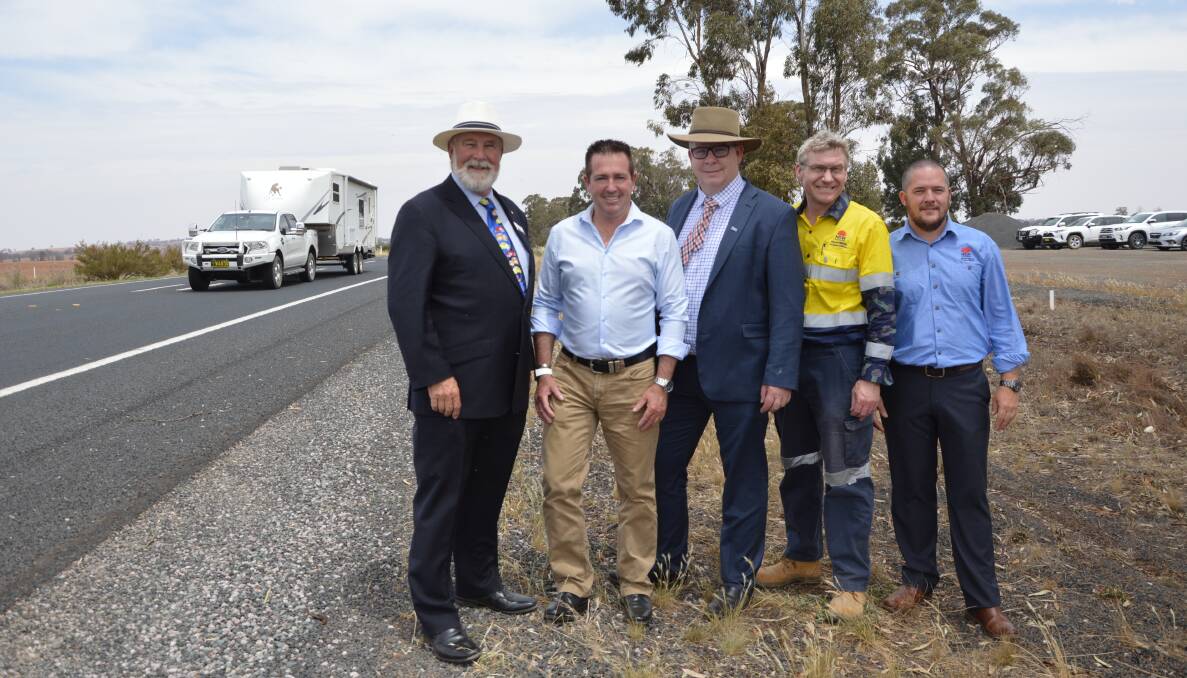 UNDERWAY: Parkes Mayor Ken Keith OAM, NSW Minister for Regional Transport and Roads Paul Toole, Transport for NSW Director Western Region Alistair Lunn, Alliance Program Manager Chris Brett and Alliance Interface Manager Andrew McLuckie inspected the site where the new overtaking lanes will be last October. Photo: Christine Little