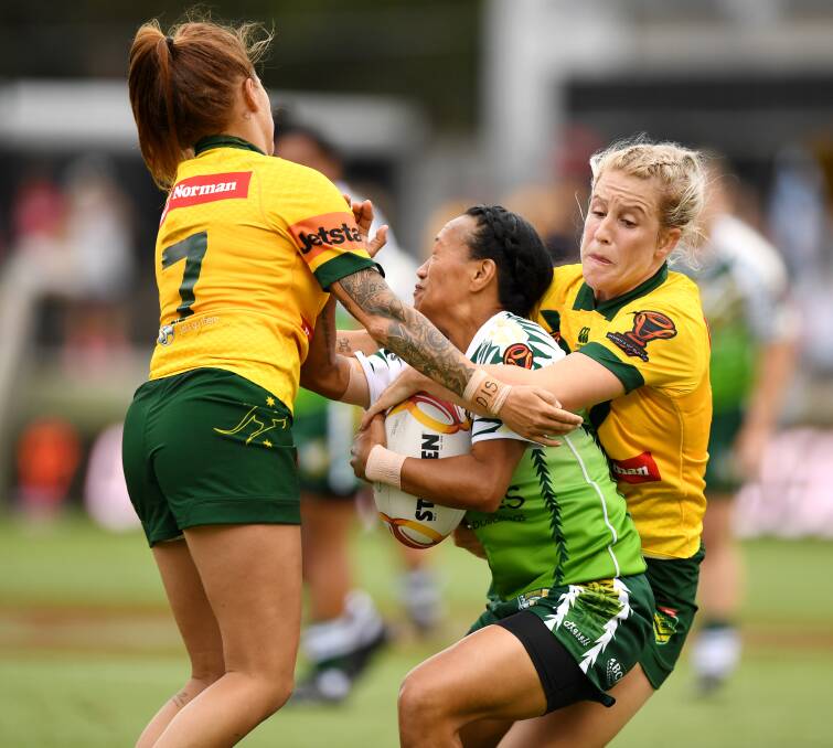 BIG ADVOCATE: Jillaroo and Cronulla Shark player Talesha Quinn (right) of Parkes, pictured during the 2017 World Cup, believes the new western women's rugby league competition will mean so much to country girls.