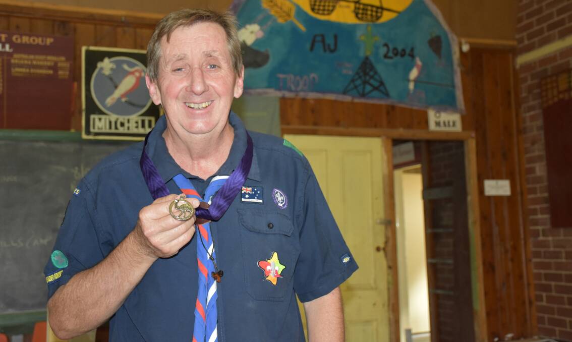 SECOND HIGHEST HONOUR: The 3rd Parkes Scout Leader Barry Read has been recognised with the Silver Emu Adult Recognition Award for his years of valuable service. Photo: Barbara Reeves