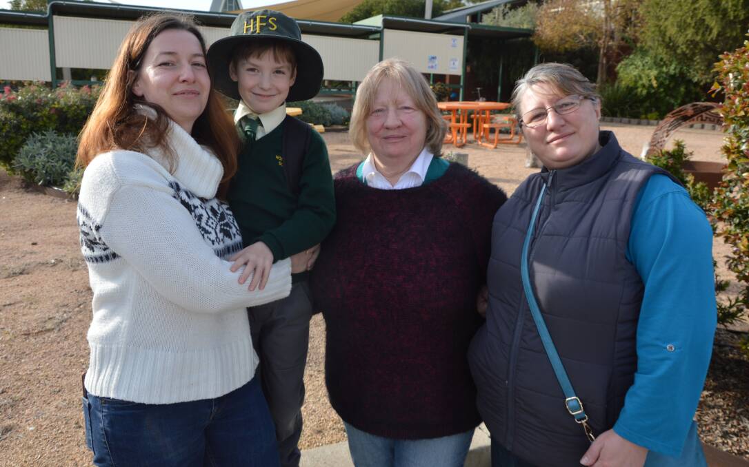 WARM WELCOME: Svetlana Volodkevych, her son Davyd Mamulashvili and her mother Nadiia Volodkevych moved to Australia from Ukraine with the help of sister and daughter Oksana Smith who lives in Parkes. Photo: CHRISTINE LITTLE