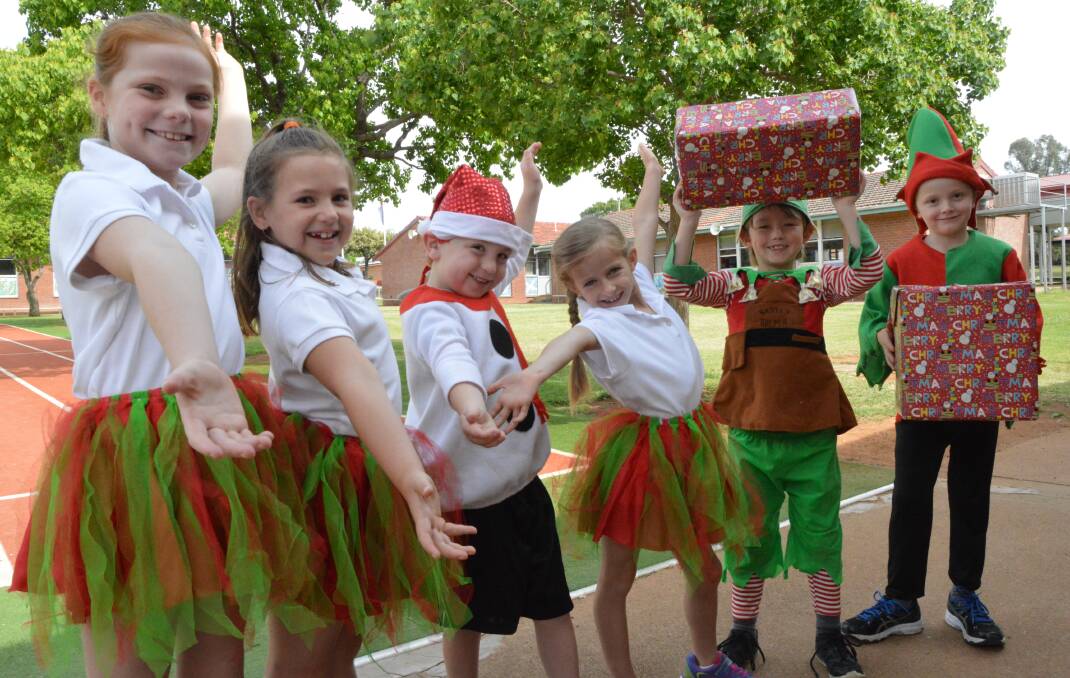 With just two weeks to go until this year's Christmas street parade, Parkes East Public School students Heidi Charlton, Miley Nash, Lockie Jones, Daisy Larsen, Max Jones and William Mathews are raring to go.