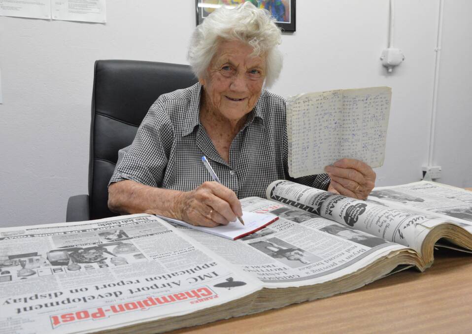 WHAT A CHAMPION: 92-year-old Margaret Morrison dedicated 32 years, almost on a weekly basis, to writing the 'Looking Back' column in the Parkes Champion Post. She even kept a log book from when she first started. Photo: Christine Little