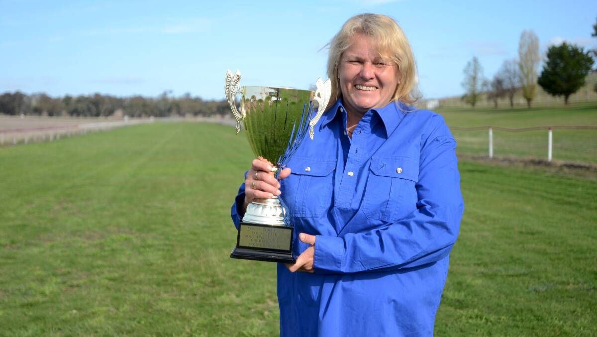 YOUNG CUP: Young Turf Club president Allison O’Hara with the Young Cup. The event continues to attract trainers from throughout the Western Districts and Riverina.
