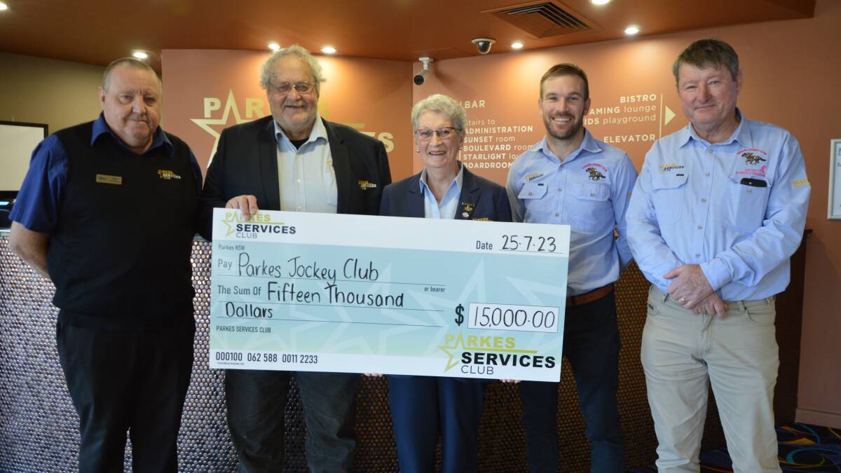 Parkes Services Club general manager Mike Phillips, director Victor Gaidzionis and president Dorothy Charlton presented a cheque for $15,000 to Parkes Jockey Club vice president Alex Prout and president Mark Ross. 