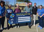 BIG HELP: Parkes tennis coach Helen Magill, Val Glasheen, Sharon Hunt, Nationals MP Scott Barrett, Dylan Dwyer from Tennis NSW and Lily McCormick at Friday's cheque presentation. Photo: CHRISTINE LITTLE