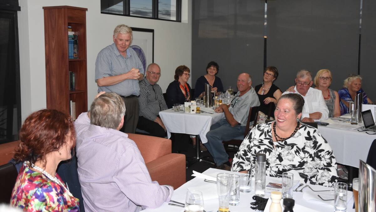 LIGHTS, CAMERA, ACTION: Parkes Action Club treasurer Mark Olson addressing the Changeover dinner. Photo: Supplied