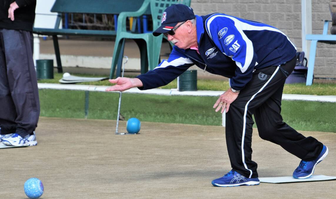 RAILWAY BOWLS: Mick Furney in action during a game at the Parkes Railway Bowling Club last month. Photo: Jenny Kingham