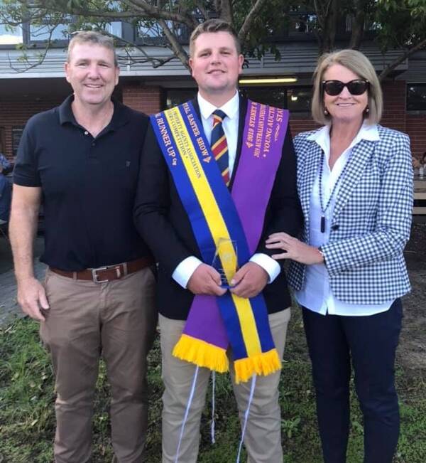 SYDNEY ROYAL EASTER SHOW: NSW Young Auctioneer runner-up Cooper Byrnes from Parkes with his parents Michael and Kylie Byrnes, formerly of Parkes.