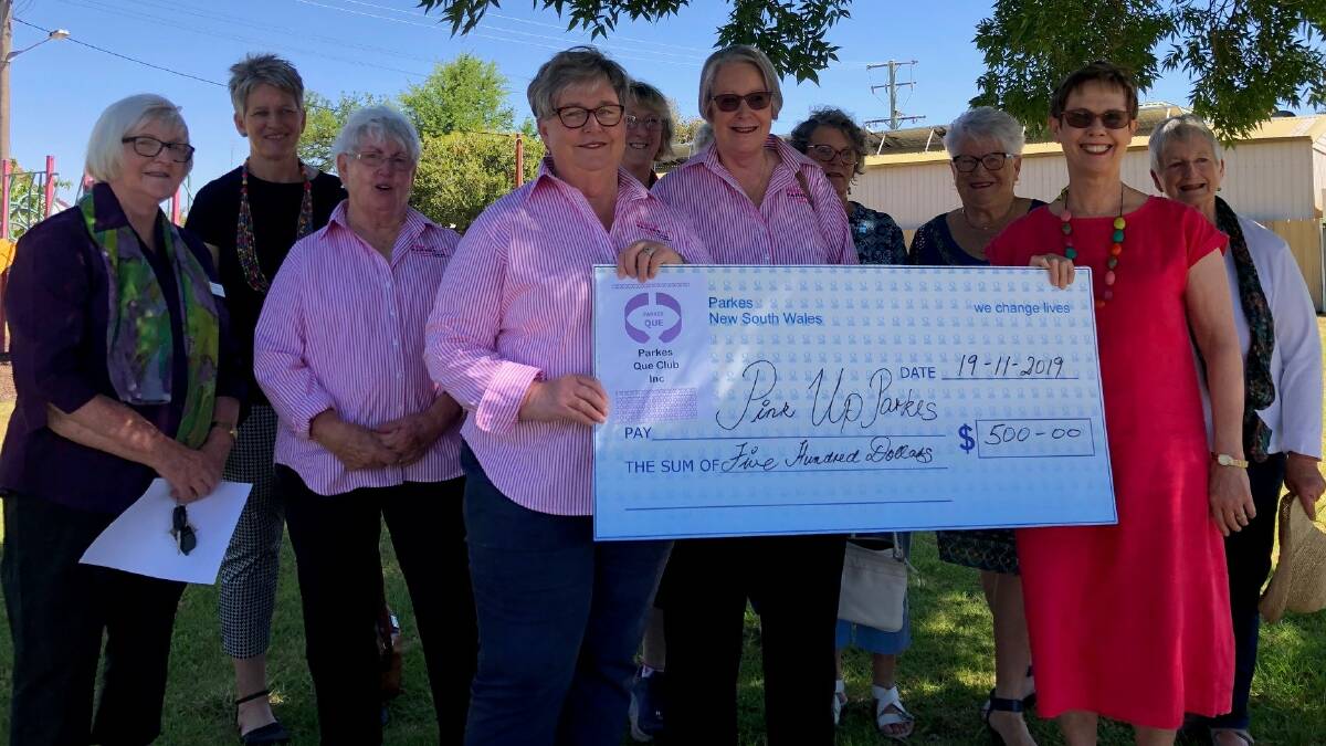 PINK UP PARKES: Miriam Luyt, Raelene Rout, Lorraine Parker, Carolyn Rice, Ruth Taylor, Jenny Breaden, Nancye Blatch, Bev Laing, Rosemary Morris and Jeanine Boland with the donation of $500 for Pink Up Parkes. Photo: Submitted