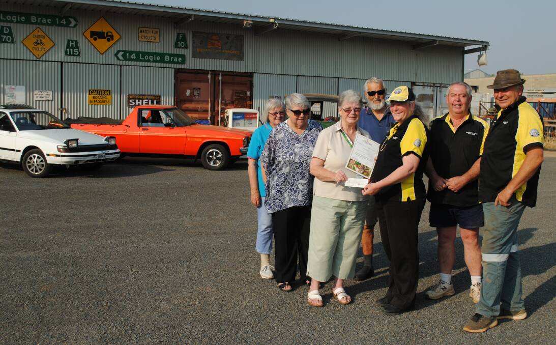 ANNUAL BOOST: Carol Southwell, Anne McLachlan, Pat Bailey (secretary) and Trevor Southwell (assistant treasurer) from Parkes Can Assist accept a generous cheque from Christine Miskell (CWCC Show and Shine coordinator), Warwick
Miskell (CWCC) and Rodney Barnes (president CWCC). Photo: Jeff McClurg