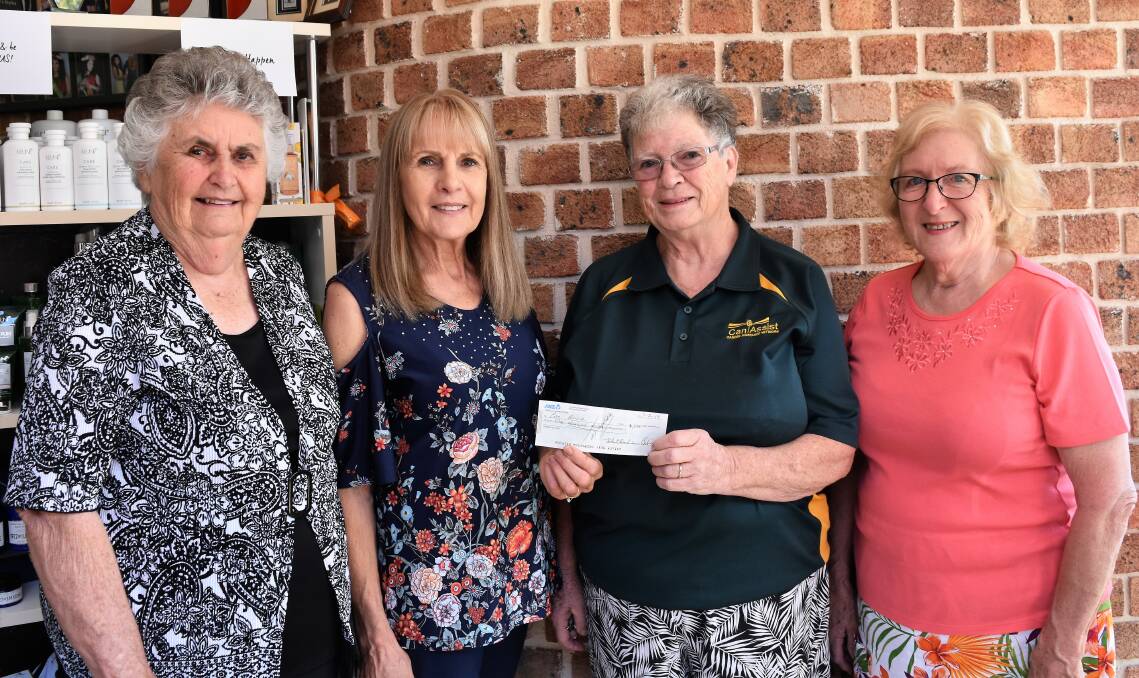 VITAL FUNDS: Adele Hawke (second from left) presented a cheque for $1000 raised from the Toby Hawke Memorial Shoot last August to Parkes Can Assist's Zelma Fisher (left), Pat Bailey and CanAssist president Sylvia Glendenning. Photo: Jenny Kingham
