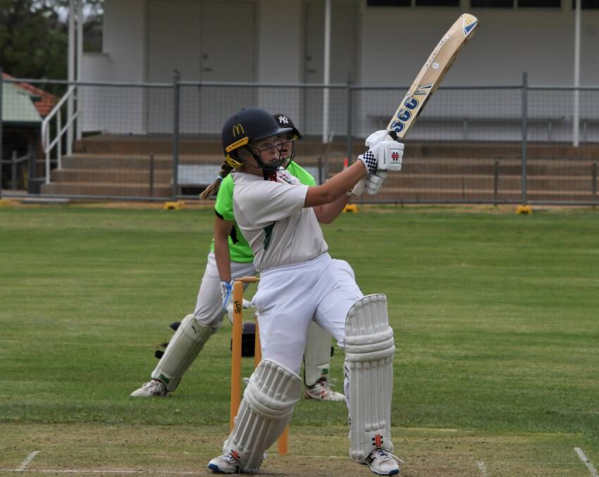 UNDER 17S: Parkes Cats under 17s player Maddy Spence in action last month when the side played Forbes Achesons at Woodward Oval. Photo: Jenny Kingham 
