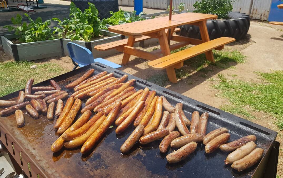 TUCKER: Peak Hill Preschool tried emu and kangaroo sausages on Wednesday, with the consensus being they all tasted nice, and some came back for seconds and thirds! Photo: Facebook
