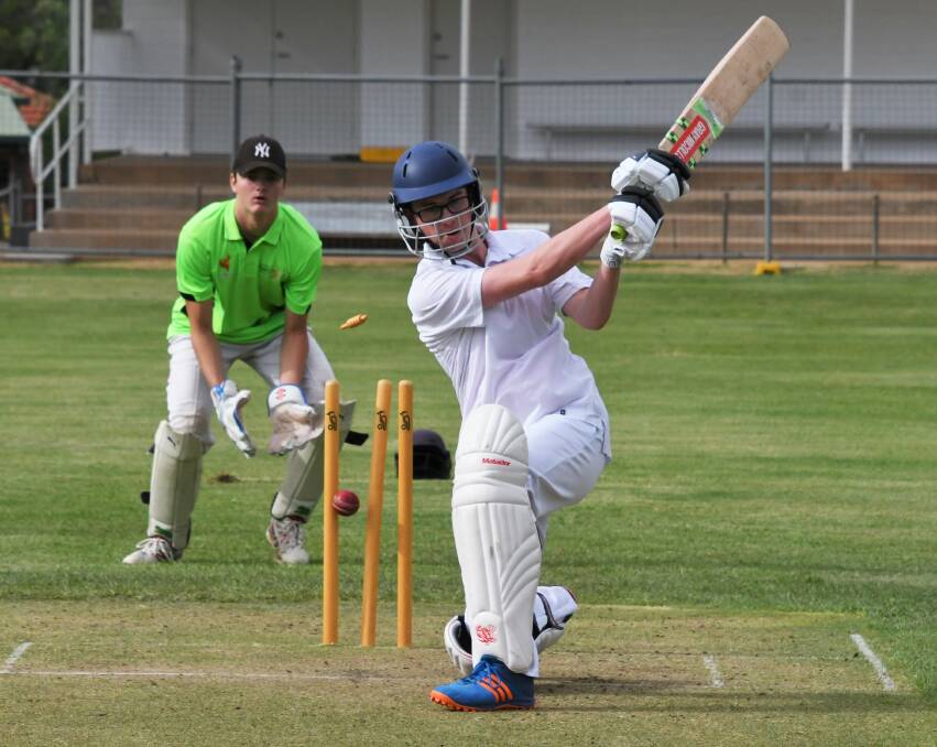 UNDER 17S: Parkes Cats batsman Ryan Mackenzie was stumped by a Forbes Achesons bowler. Pictured in the background is Forbes wicket keeper Luke McDean. Photo: Jenny Kingham