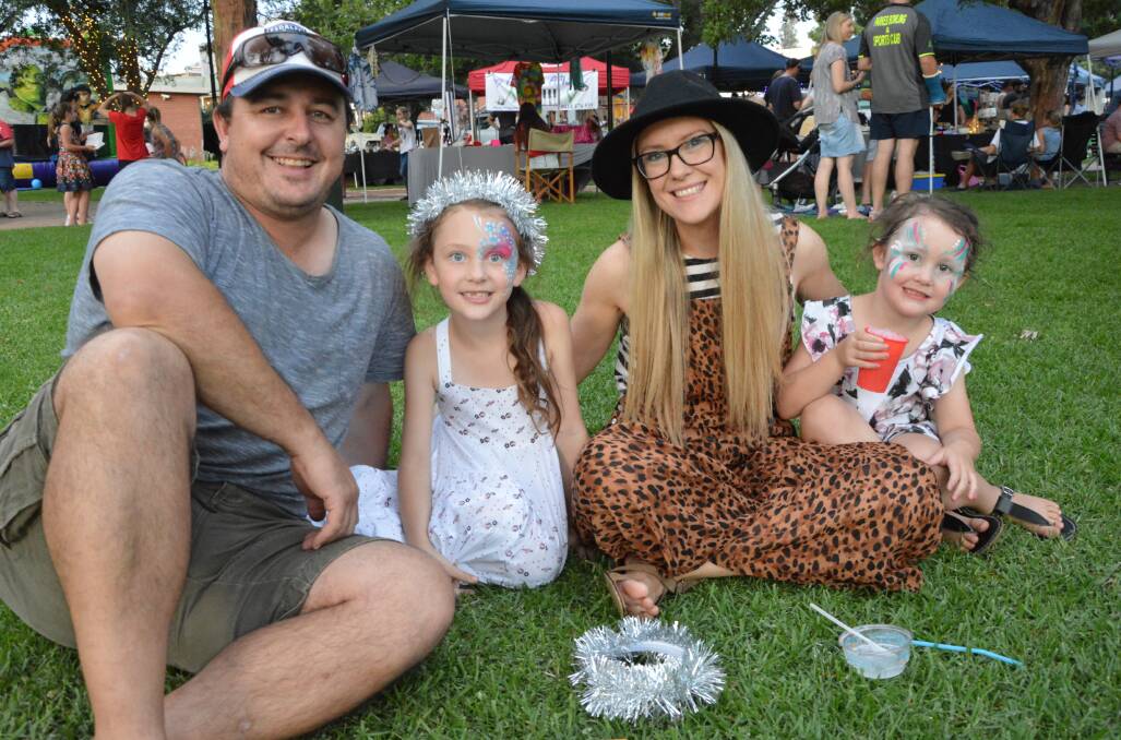 FAMILY: Jono and Evie Barnes, Katie Shambrook and Luca Barnes enjoyed the Sparkle in the Park event in Cooke Park last year.